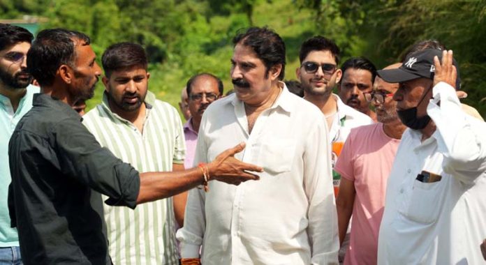 Cong-NC candidate from Jammu East Yogesh Sawhney interacting with people in Bajalta area.