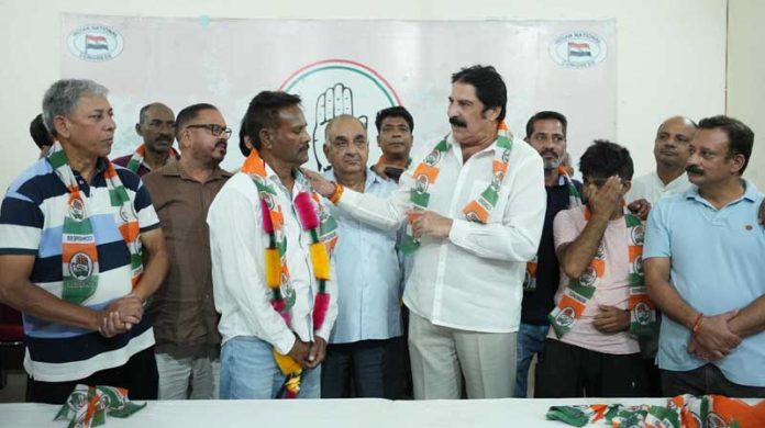 Congress candidate from Jammu East Yogesh Sawhney welcoming new entrants into party in Jammu.