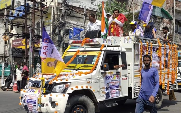 DPAP candidate from Jammu North Assembly segment Advocate Maheshwar Singh Manhas during car rally taken out on Sunday.