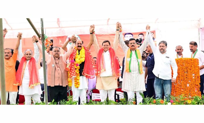 UK Chief Minister, Pushkar Singh Dhami, BJP national general secretary, Tarun Chugh and party candidate, Surjit Singh Salathia at an election rally in Samba on Thursday.