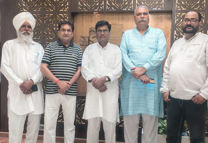 BJP SC Morcha National general secretary, Sanjay Nirmal along with other leaders of Morcha at a meeting in Jammu on Sunday.