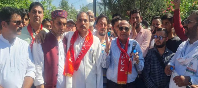 NC provincial president, Rattan Lal Gupta along with NC candidate from Ramban constituency, Advocate Arjun Singh Raju during an election rally.