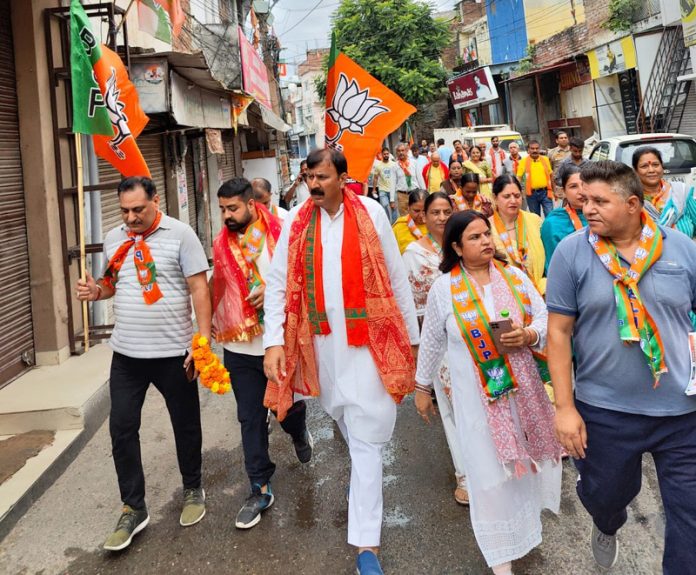 BJP leader, Arvind Gupta, campaigning in Jammu West Assembly constituency.