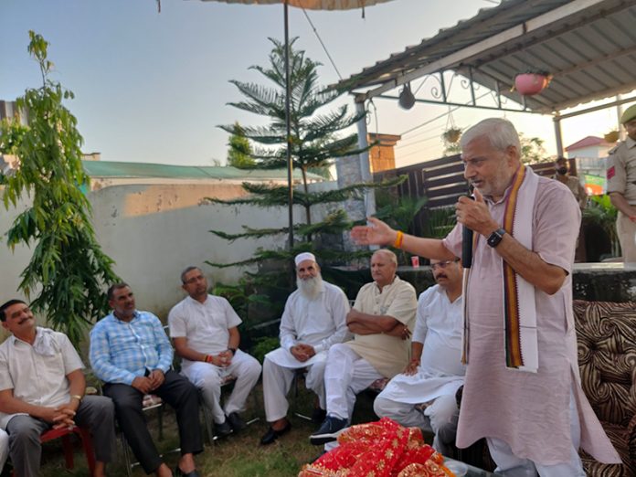 Former Minister and BJP candidate, Sham Lal Sharma addressing party workers in Jammu North on Thursday.