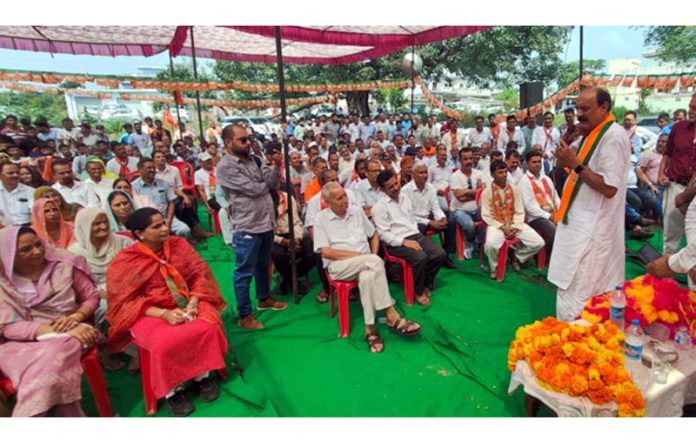 BJP candidate for Samba, SS Slathia addressing an election rally at a Samba village on Wednesday.