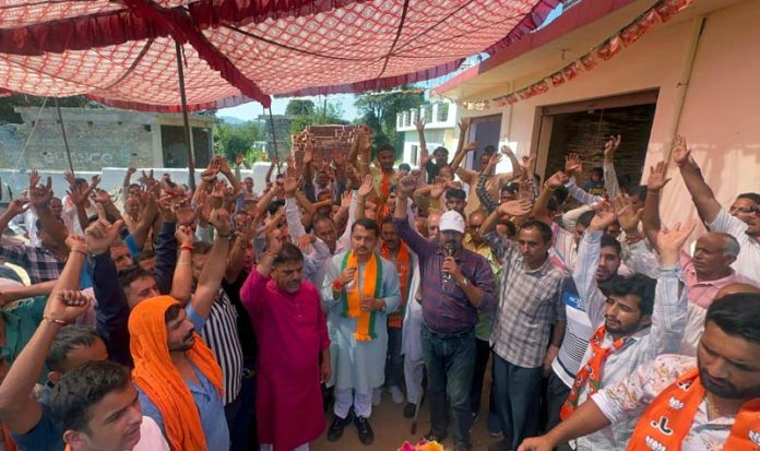 R S Pathania with his supporters and BJP workers during an election campaign meeting in Udhampur East.