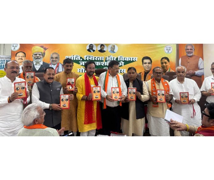 Union Ministers Dr Jitendra Singh, G Kishan Reddy and BJP leaders releasing Dr Kuldeep Mahotra's book on Article 370 at Jammu on Monday.