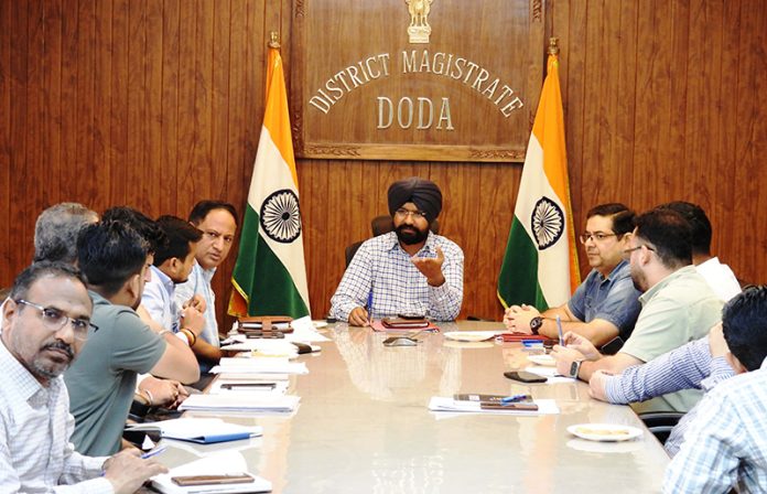 DC Doda Harvinder Singh chairing a meeting.