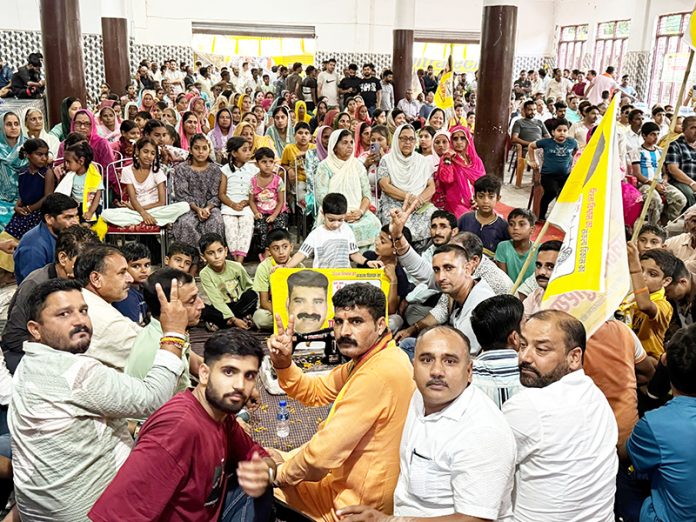 Independent candidate, Pawan Khajuria during an election meeting at Jaganoo Udhampur on Friday.