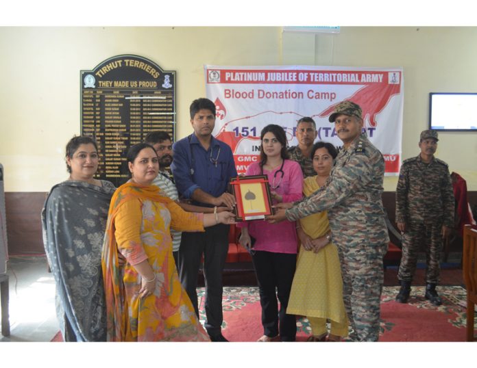 The blood donors being awarded after the camp at Udhampur on Saturday.