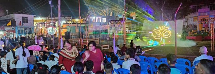 People enjoying Laser Show during Basohli Utsav.