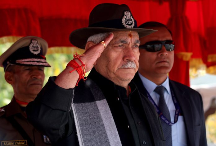 LG Manoj Sinha takes salute during the attestation ceremony of new recruits at BSF Subsidiary Training Centre in Humhama, Budgam on Saturday. -Excelsior/Shakeel