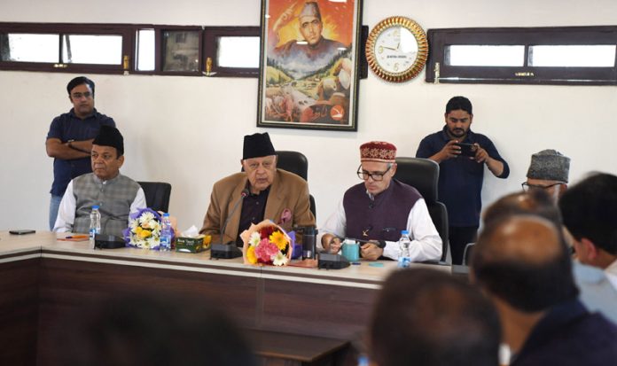 NC president Dr Farooq Abdullah and Omar Abdullah at the NCLP meeting in Srinagar on Thursday. -Excelsior/Shakeel