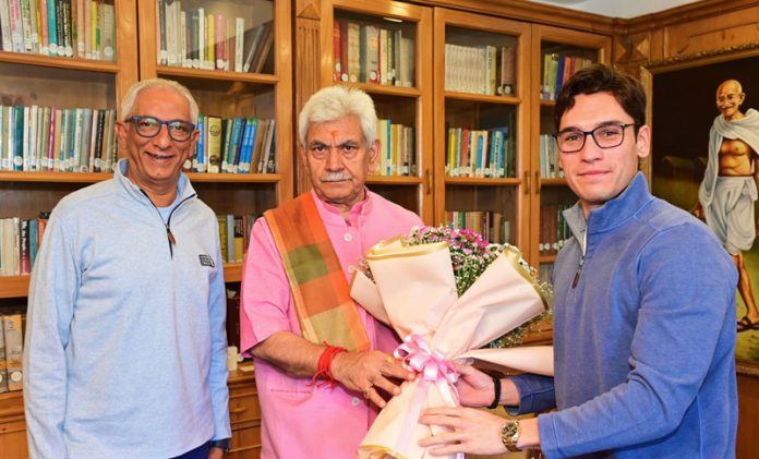 LG Manoj Sinha receiving a bouquet from Founder & Chairman, LLC, Vivek Khushalani and Co-Owner, Yuvraj Kilachand at Raj Bhawan, Srinagar.