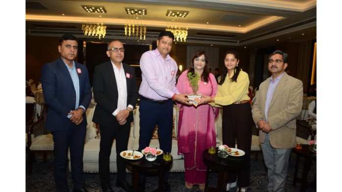 Dignitaries receiving plant during Round Square event at Jammu.