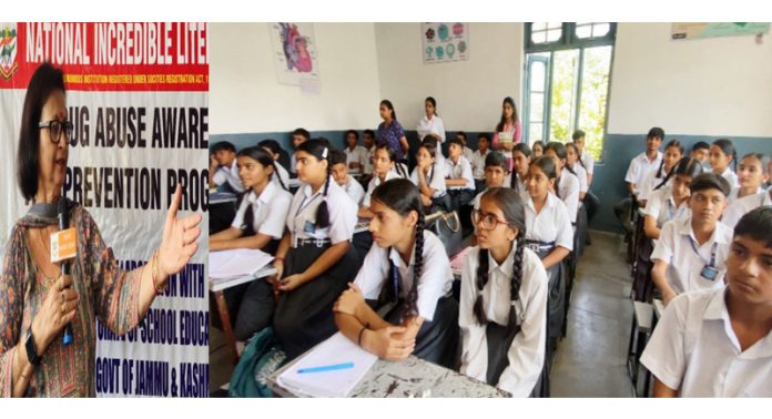 Dignitary addressing students during drug abuse awareness programme at Shining Star High School, Muthi, Jammu.