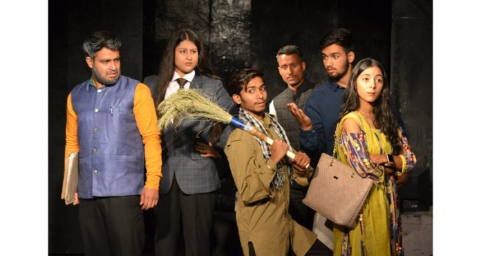 A scene from the play 'Sarkari Daftar Ka Ek Din' being staged in Jammu on Sunday.