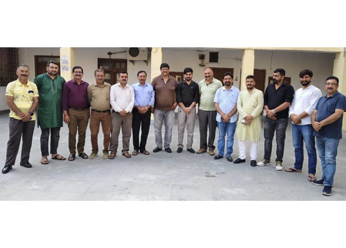 Members of Mata Rudra Ganga Trust posing for a group photograph at Jammu on Monday.