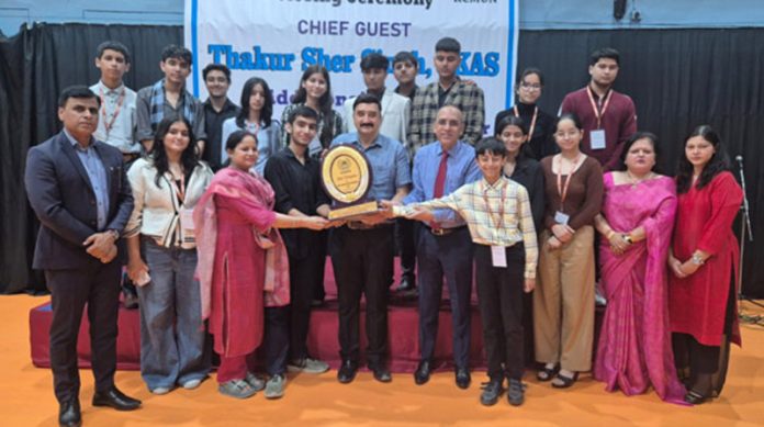 Winner students of KCIS in the event ‘Model United Nation’ posing for a photograph with others.