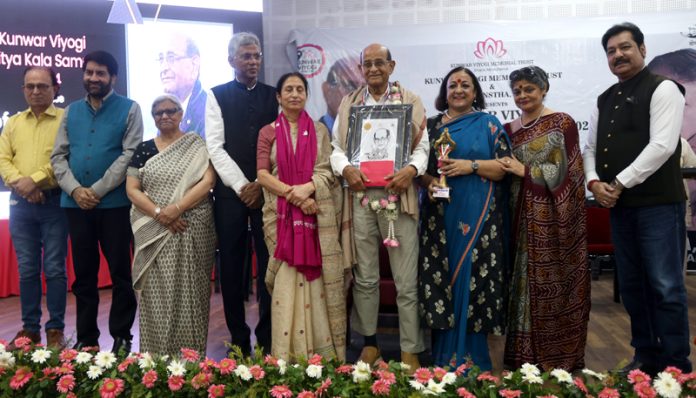 Prof Lalit Mangotra and others during presentation of Kunwar Viyogi Sahitya Kala Samman to him on Sunday. -Excelsior/Rakesh