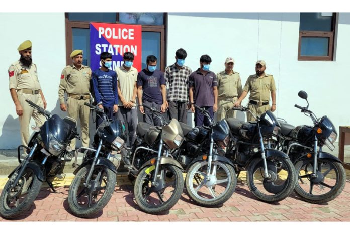 Stolen motor cycles recovered by Samba Police on Sunday from the arrested thieves who are also seen in the picture.