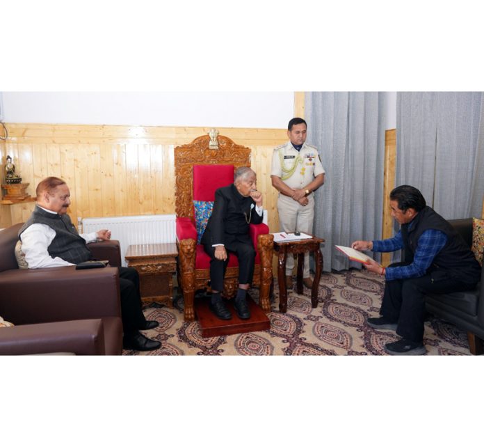 Councillor Stanzin Lakpa interacting with LG Ladakh, Brigadier (Retd) BD Mishra on Saturday.