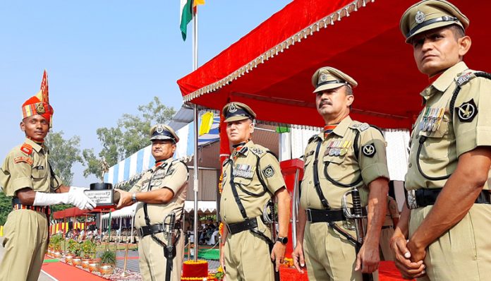 IG BSF presenting trophy to a recruit constable on Saturday.