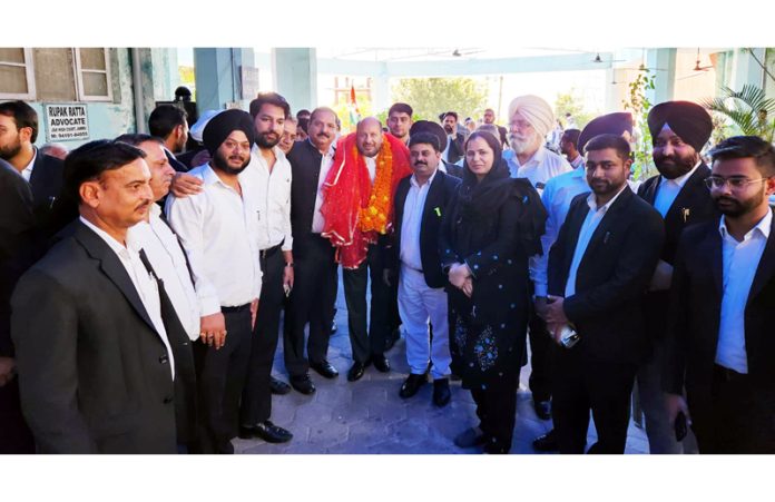 Cong working president for JKUT Adv Mohinder Bhardwaj being felicitated by lawyers during function in High Court Complex at Jammu.