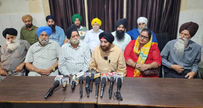 SUF Chairman Sudershan Singh Wazir addressing press conference in Jammu. -Excelsior/Rakesh