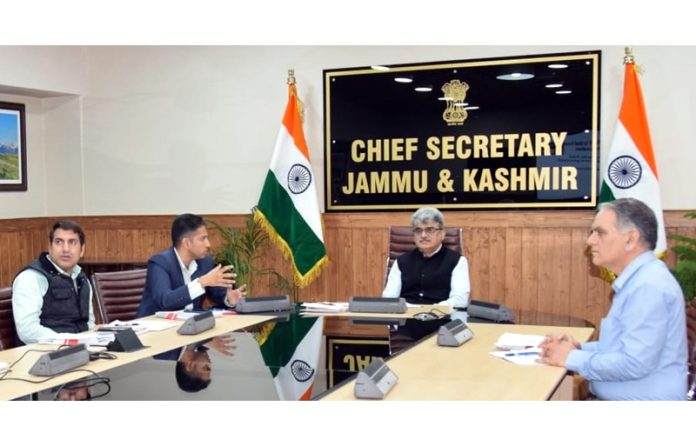 Chief Secy Atal Dulloo chairing a meeting in Srinagar on Monday.