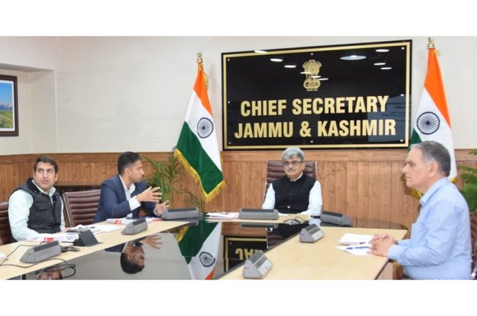 Chief Secy Atal Dulloo chairing a meeting in Srinagar on Monday.