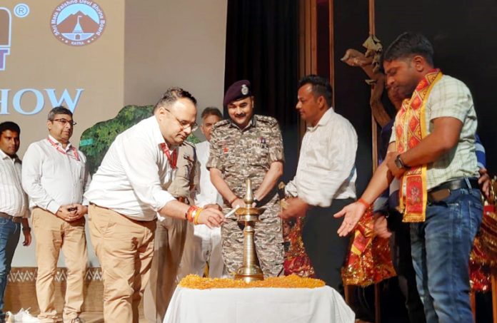 Joint CEO Shrine Board Satish Sharma lighting the lamp to inaugurate Divyang talent show at Katra on Monday.