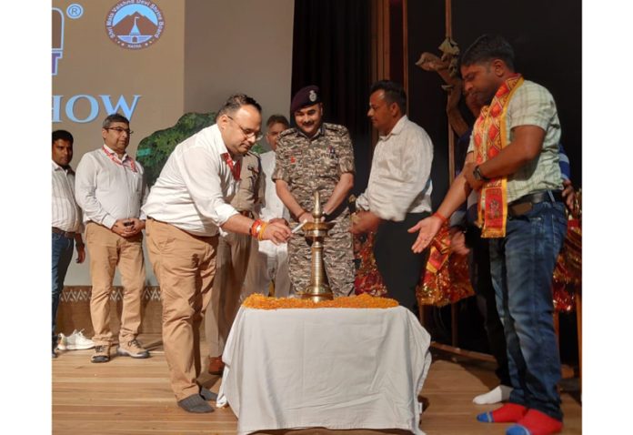 Joint CEO Shrine Board Satish Sharma lighting the lamp to inaugurate Divyang talent show at Katra on Monday.