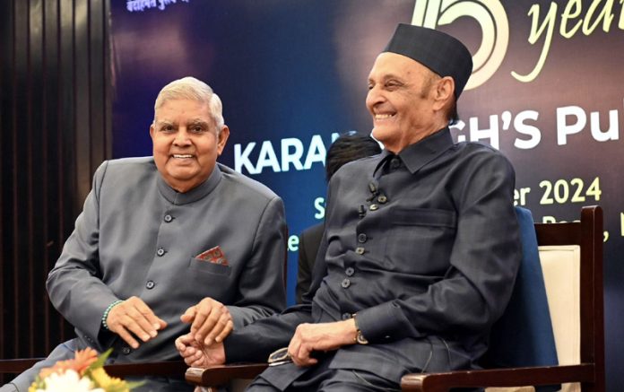 Vice President Jagdeep Dhankhar and Dr Karan Singh during felicitation ceremony of the latter on completion of his 75 years in public life, in New Delhi on Sunday.