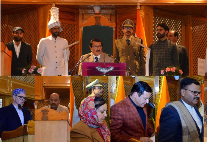 Pro-tem speaker Mubarak Gul administering oath to Chief Minister, DyCM, Monisters and newly elected members of the Jammu & Kashmir Assembly.