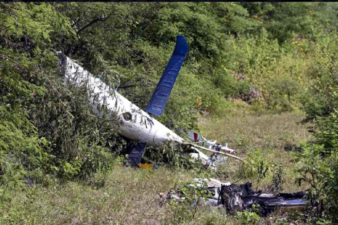 Wreckage of a helicopter after it crashed in Pune district on Wednesday.