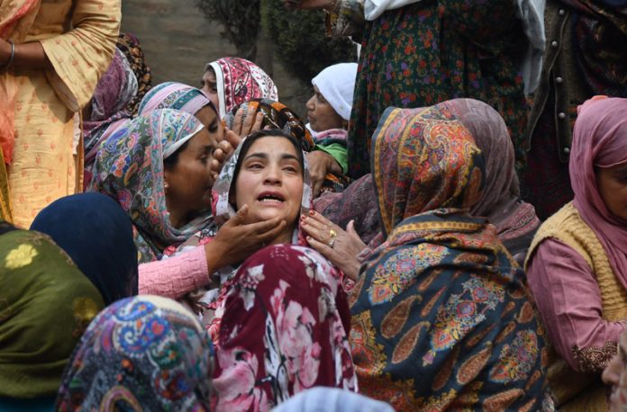 Family members and relatives of Dr Shahnawaz mourning during last rites in Budgam on Monday. Another pic on page 11. -Excelsior/Shakeel