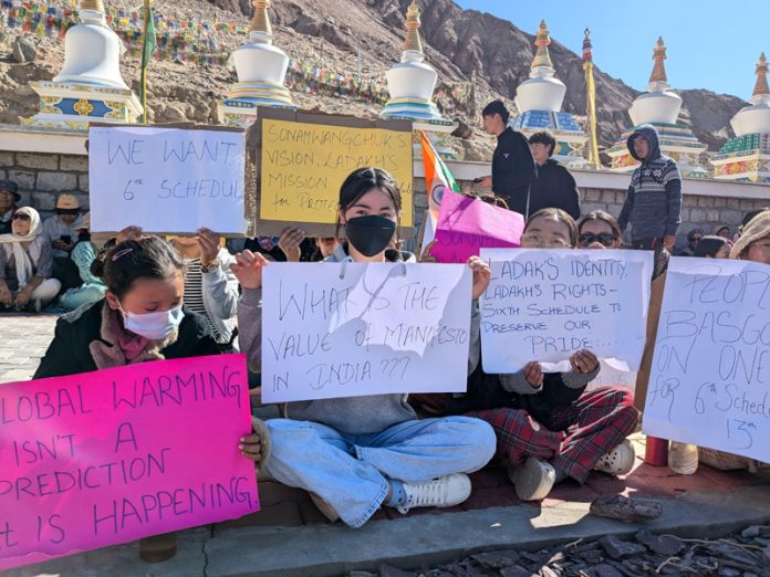 Protesters in Leh on Sunday.