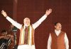 Prime Minister Narendra Modi waving to thank the people for granting the BJP a decisive victory in J&K and Haryana at party headquarters in New Delhi on Tuesday. (UNI)