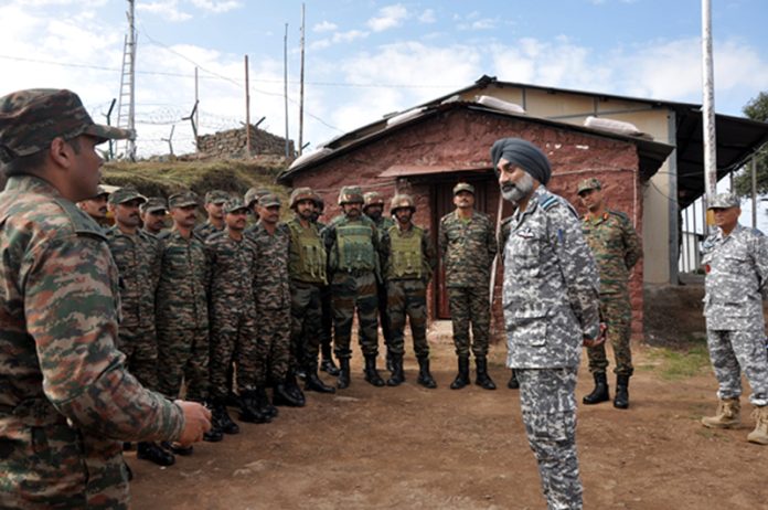 IAF chief ACM AP Singh with Air Warriors at a forward location in Jammu on Wednesday.