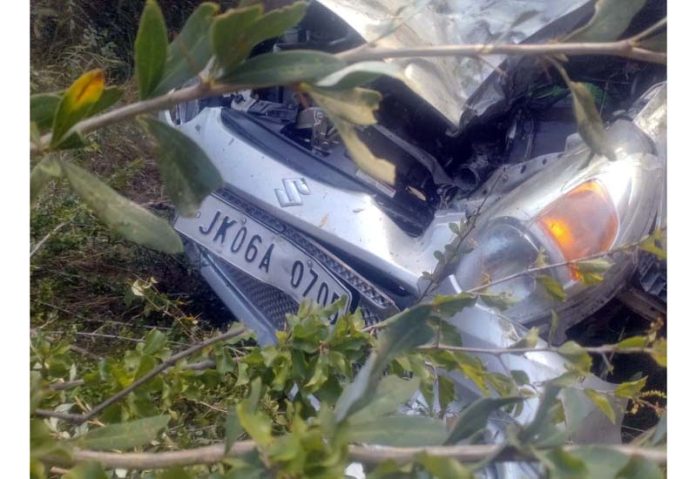 Mingled remains of car which fell in gorge in Kishtwar on Monday. -Excelsior/Tilak Raj