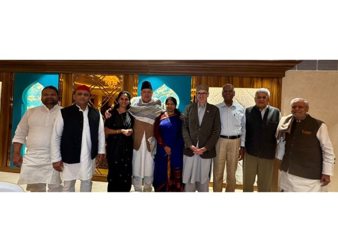 INDIA bloc leaders posing with Dr Farooq Abdullah and Omar Abdullah in Srinagar on Tuesday.