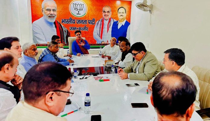 BJP president Ravinder Raina chairing party’s Core Group meeting in Jammu on Friday.