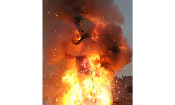 Effigy of demon King Ravana being torched to flames at Parade Ground, Jammu during Dussehra celebrations on Saturday. — Excelsior/Rakesh