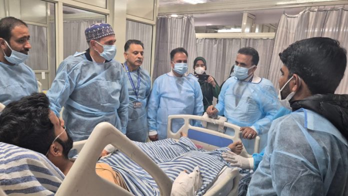 Chief Minister Omar Abdullah inquiring condition of an injured at SKIMS Soura on Monday.