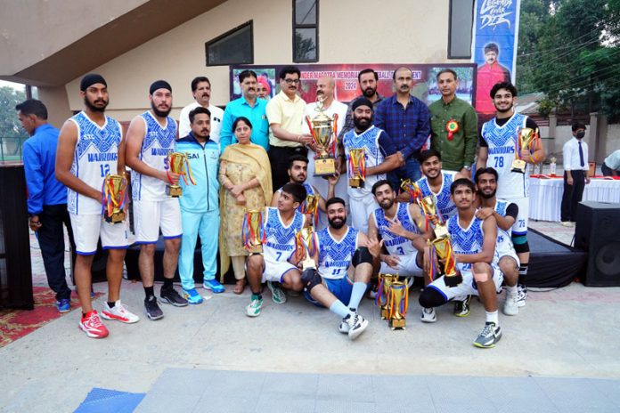 STC Warriors posing along with winner's trophy and dignitary on Sunday.