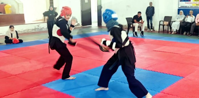 Girls in action during Inter District UT Level Thang-Ta Championship at Ganderbal.