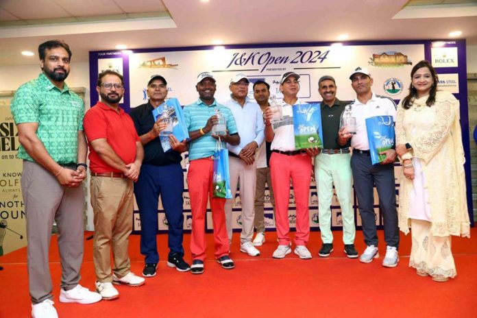 Dignitaries posing along with amateur and professional golfers during Pro-Am event at Jammu on Sunday.