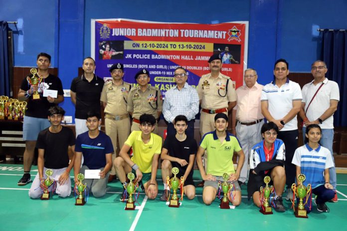 Junior Badminton players posing along with dignitaries at Jammu on Sunday.