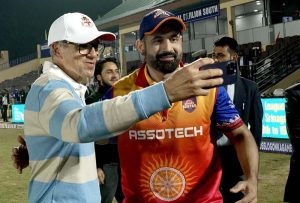 Omar Abdullah taking a selfie with cricketer Irfan Pathan at Bakshi Stadium in Srinagar on Saturday.-Excelsior/Shakeel 